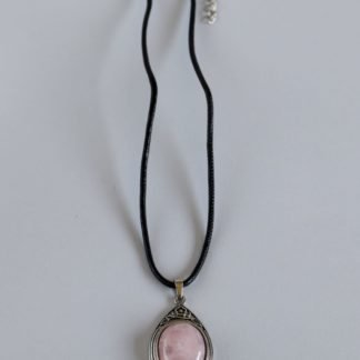 Faux Leather Necklace With a Pink Pendant In a Silver Frame