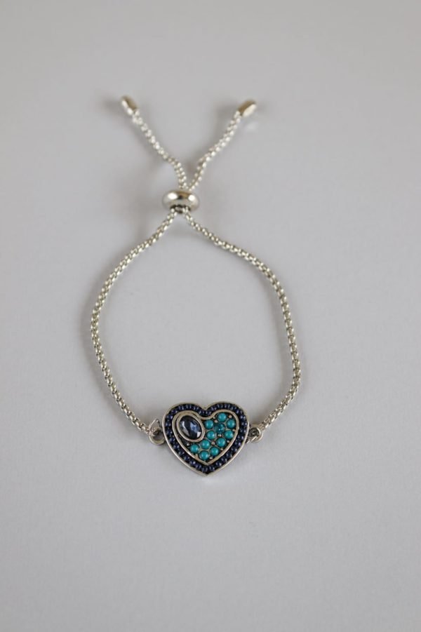 Stone Studded Heart Pendant on Silver Bracelet